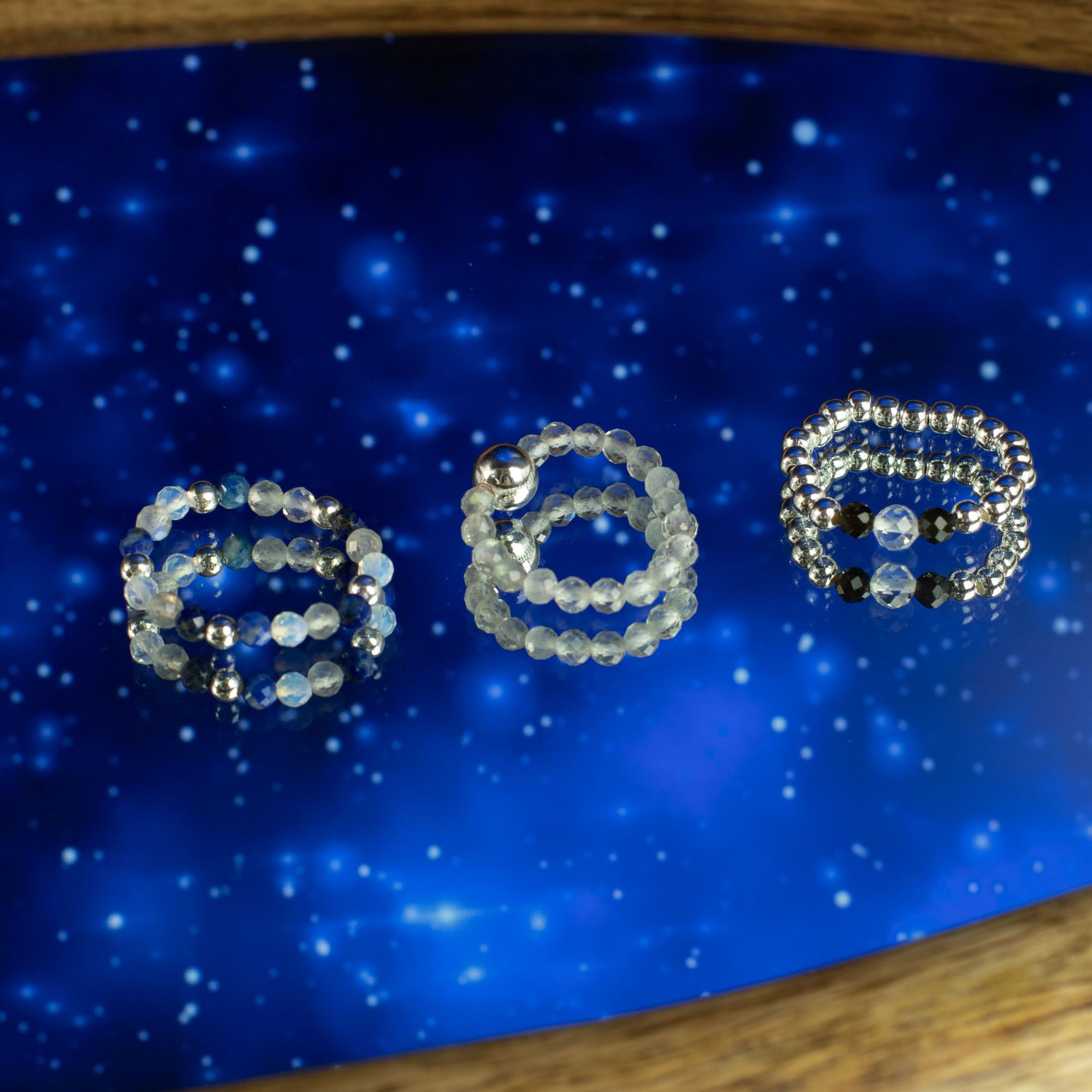 Conjunto de Anéis com Pedra Nymph – Aurora Boreal