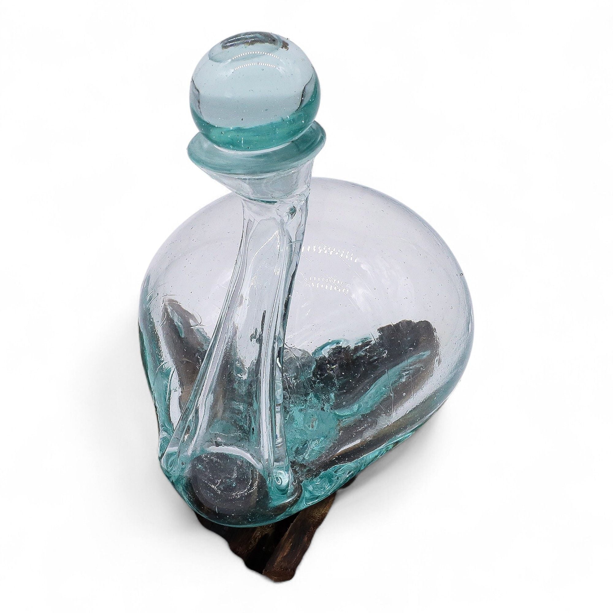 Duck-shaped decanter in cast glass on a wooden base