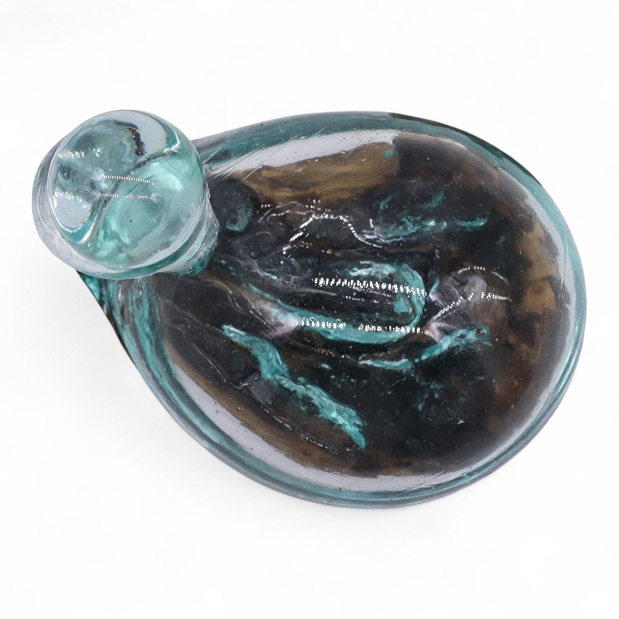 Duck-shaped decanter in cast glass on a wooden base